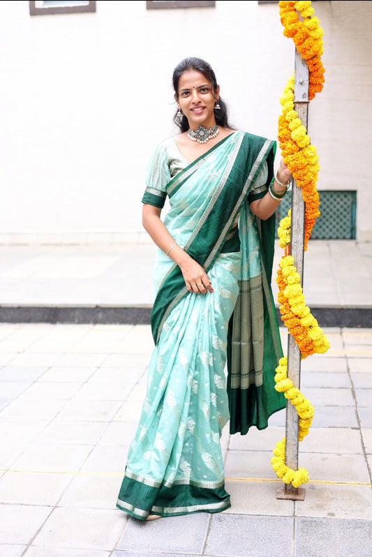 Warm Silk Saree with Contrast Border and Water Zari Work